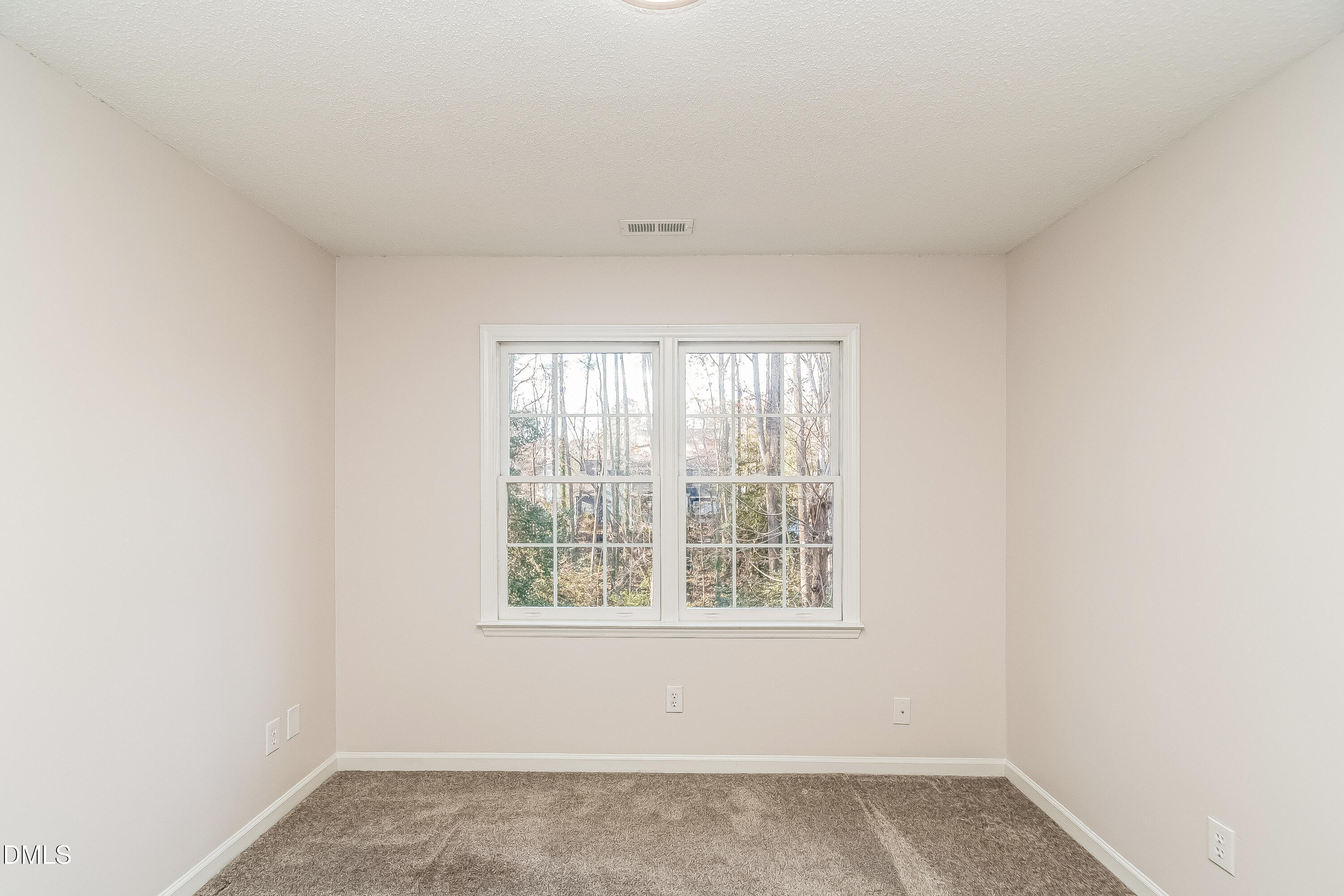 6005 Chittim Court Raleigh, NC 27616 - Photo 15 of 19 an empty room with a window