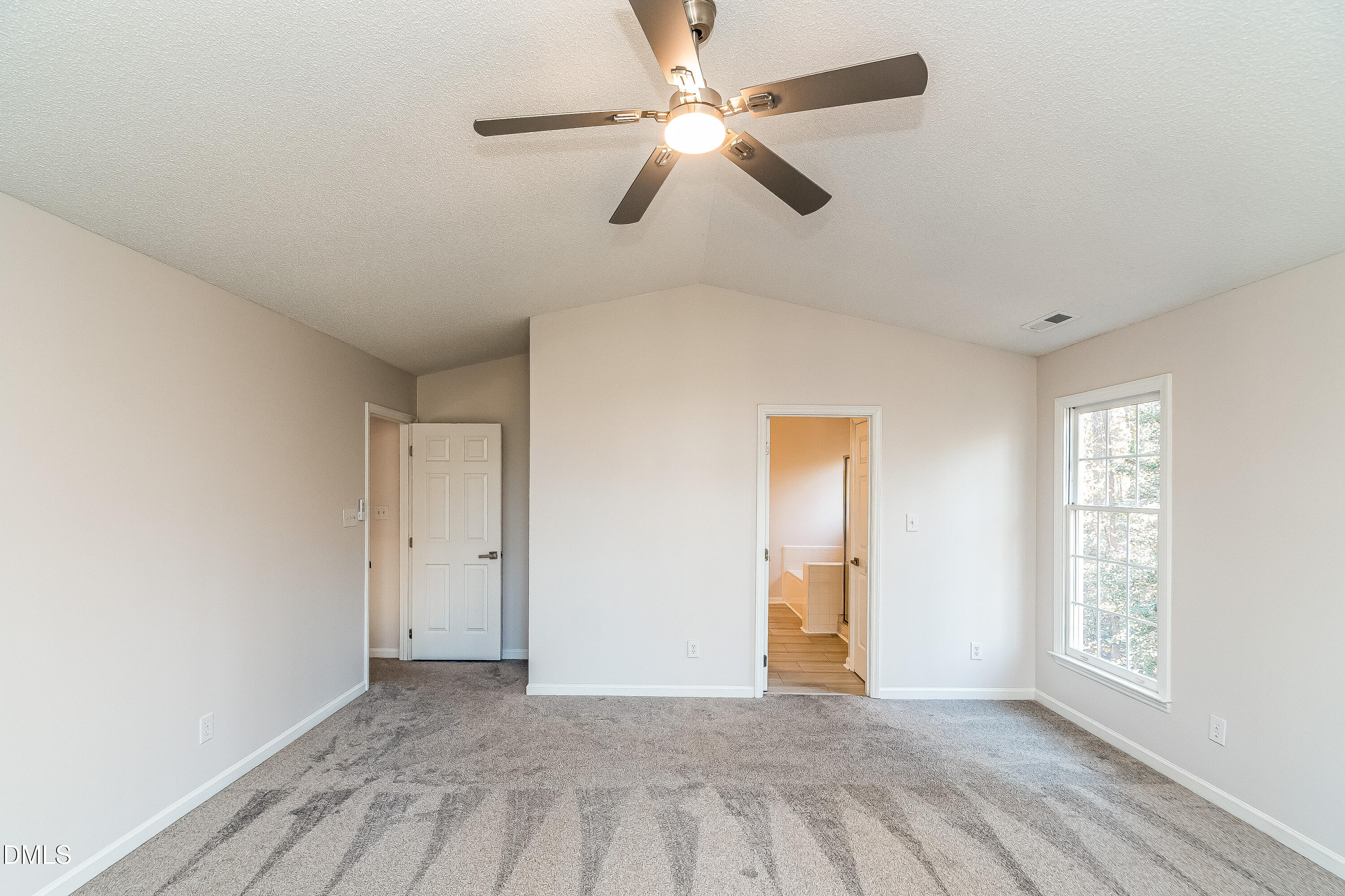 6005 Chittim Court Raleigh, NC 27616 - Photo 9 of 19 a view of an empty room with a window