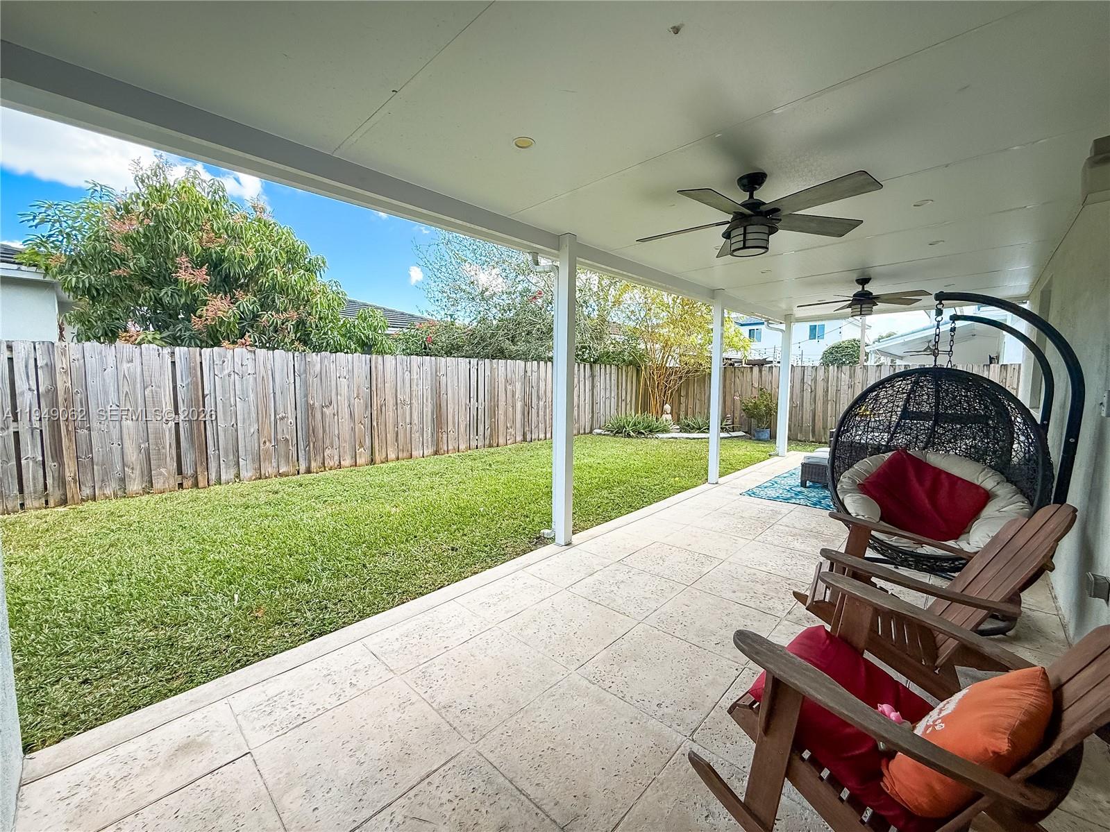 17931 Southwest 152nd Avenue Miami, FL 33187 - Photo 25 of 29 a view of yard with patio