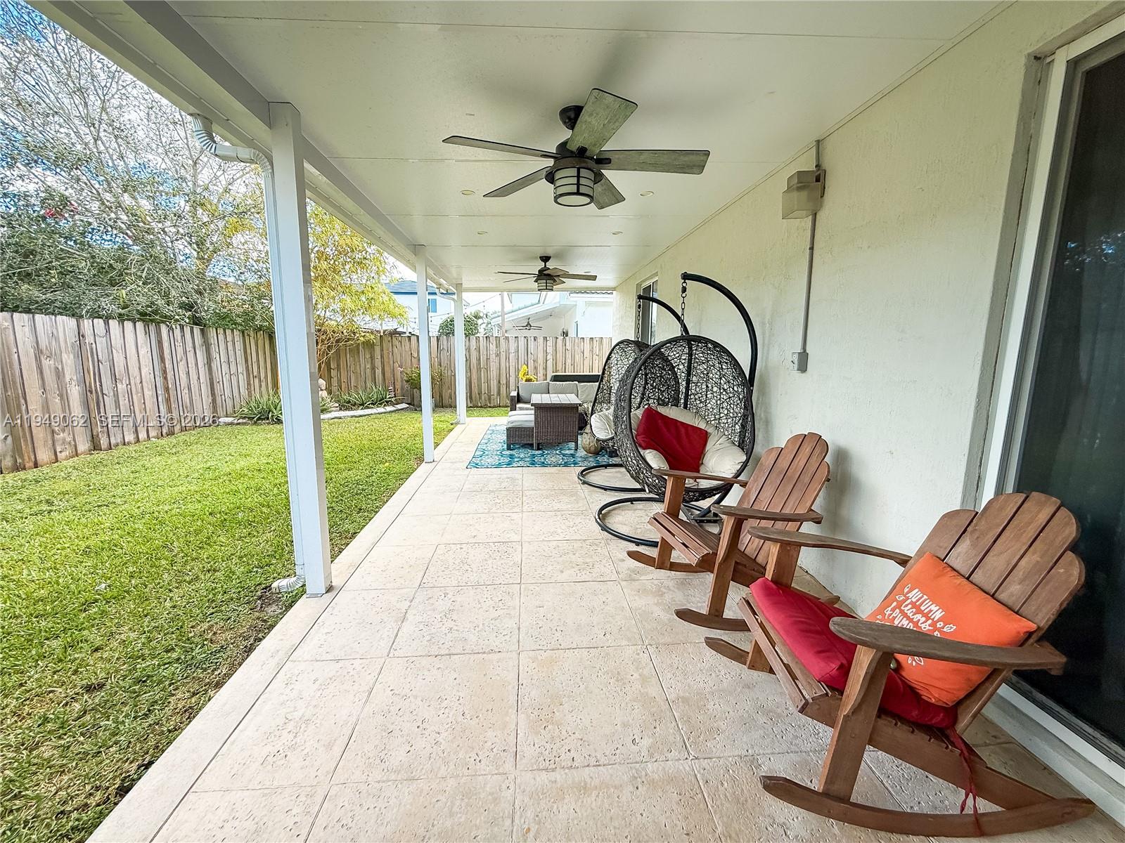 17931 Southwest 152nd Avenue Miami, FL 33187 - Photo 26 of 29 a sitting area with furniture and garden view