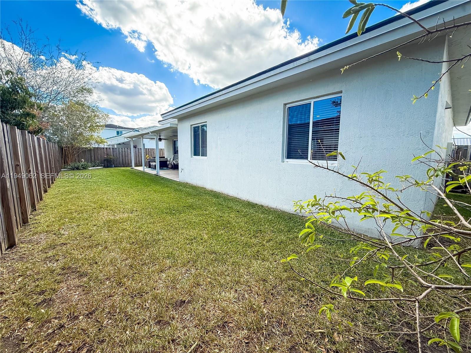 17931 Southwest 152nd Avenue Miami, FL 33187 - Photo 27 of 29 a backyard of a house