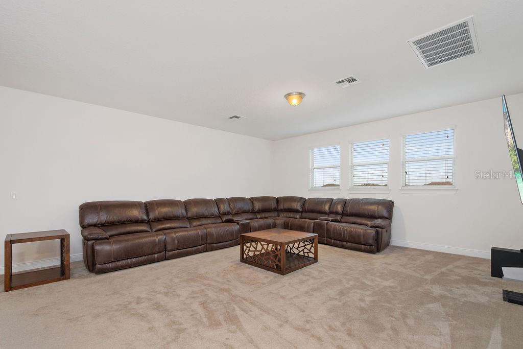 17538 Black Rail Street Windermere, FL 34786 - Photo 16 of 32 a living room with furniture