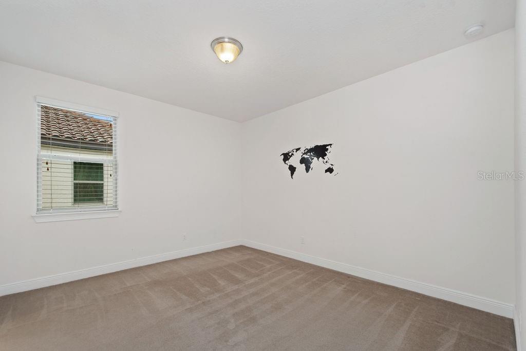 17538 Black Rail Street Windermere, FL 34786 - Photo 22 of 32 an empty room with a window