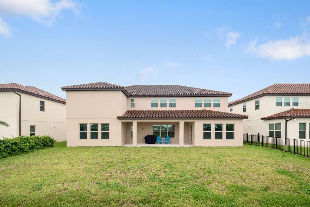 17538 Black Rail Street Windermere, FL 34786 - Photo 32 of 32 a front view of a house with a garden