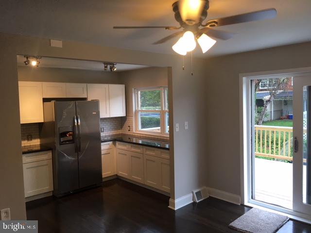 12331 Dunks Ferry Road Philadelphia, PA 19154 - Photo 1 of 21 a kitchen with a refrigerator and a chandelier