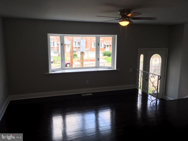 12331 Dunks Ferry Road Philadelphia, PA 19154 - Photo 12 of 21 a view of empty room with wooden floor and fan