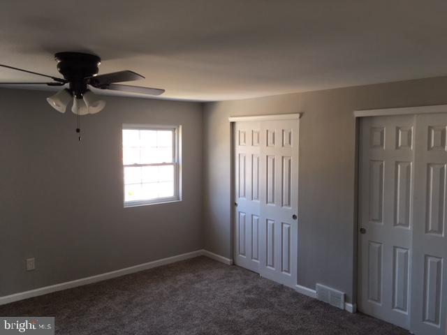 12331 Dunks Ferry Road Philadelphia, PA 19154 - Photo 17 of 21 an empty room with windows and fan