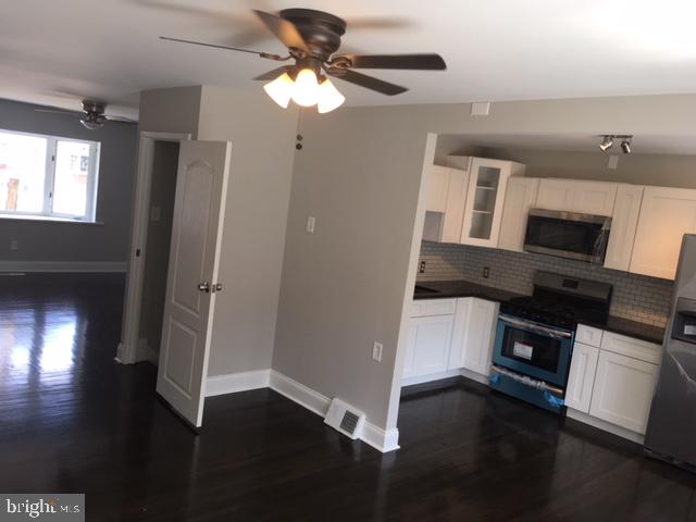 12331 Dunks Ferry Road Philadelphia, PA 19154 - Photo 9 of 21 wooden floor in an empty room with a window