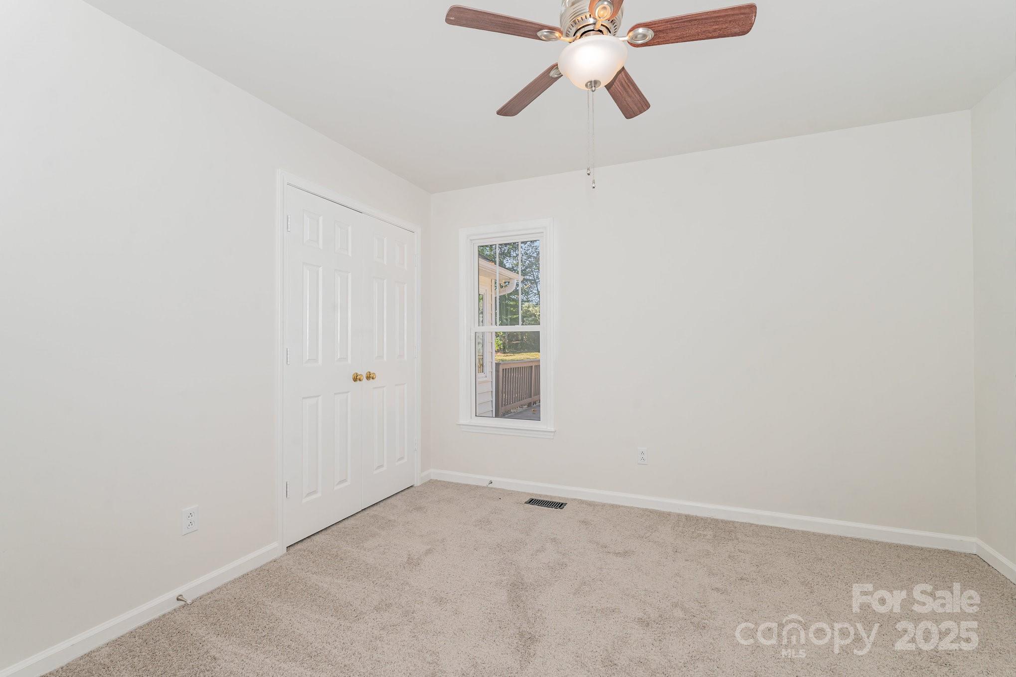 1700 Azalea Avenue Kannapolis, NC 28081 - Photo 22 of 34 a view of an empty room with a window