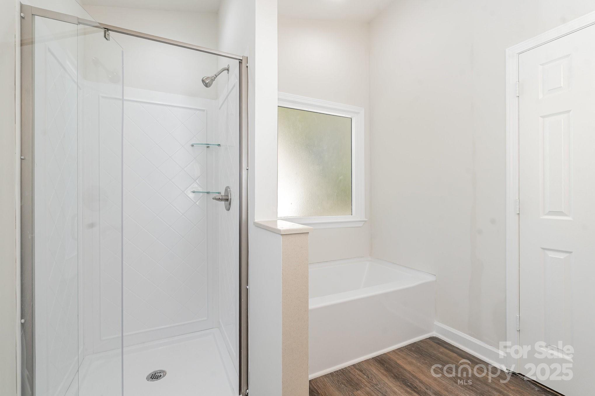 1700 Azalea Avenue Kannapolis, NC 28081 - Photo 28 of 34 a bathroom with a bathtub and a shower