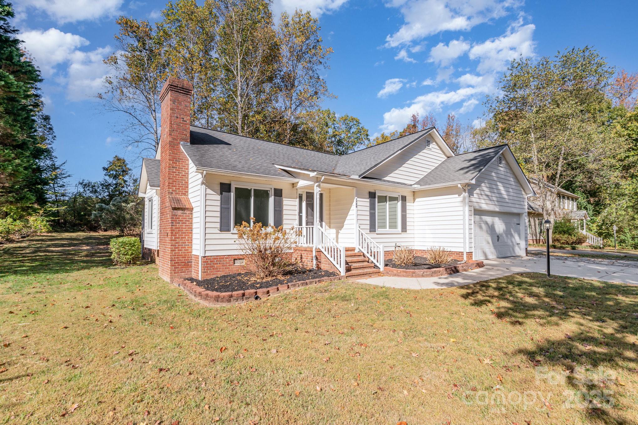 1700 Azalea Avenue Kannapolis, NC 28081 - Photo 4 of 34 a house view with a outdoor space