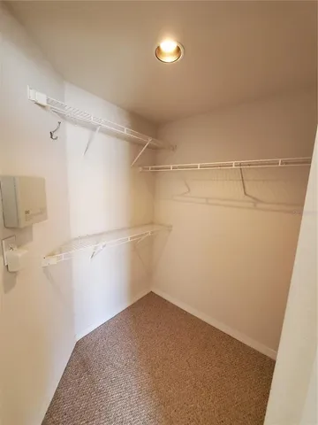 a view of a room with racks on the wall