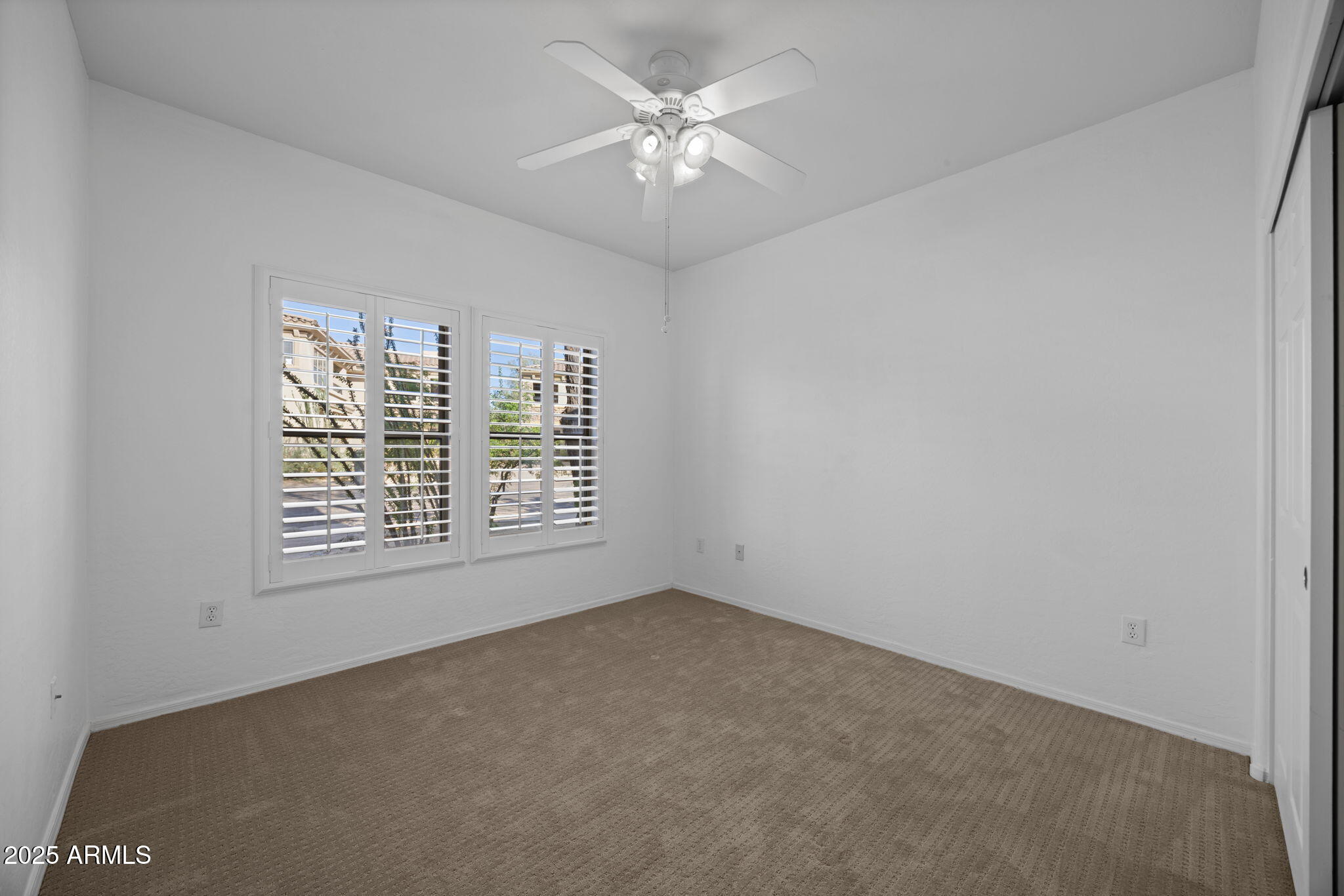 19700 North 76th Street, Unit 1040 Scottsdale, AZ 85255 - Photo 16 of 30 a view of an empty room with a window