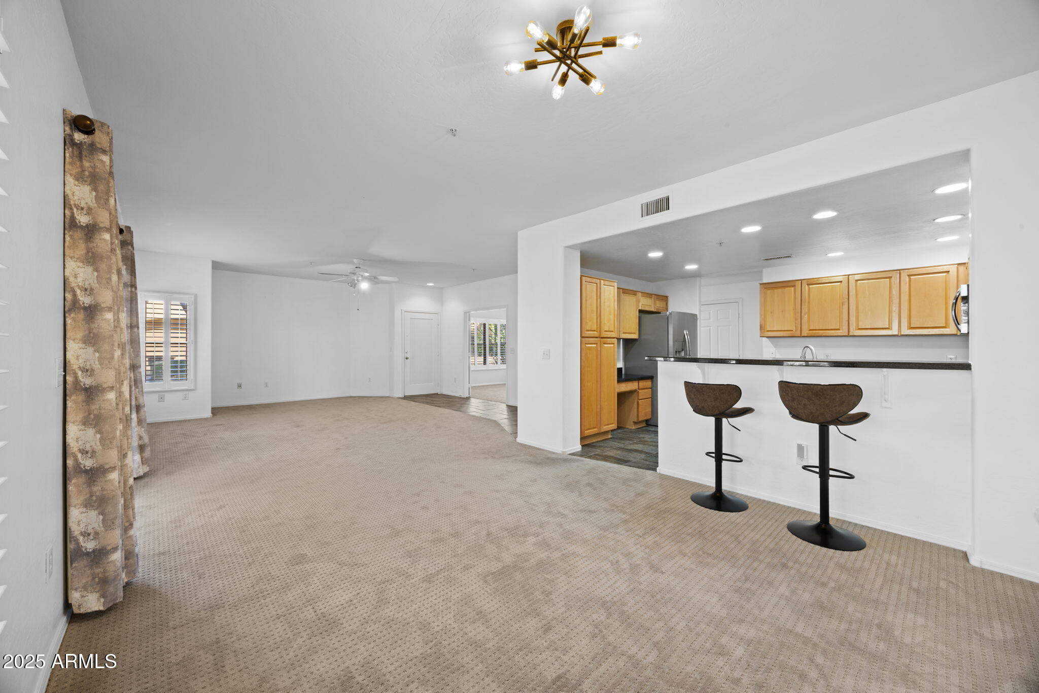 19700 North 76th Street, Unit 1040 Scottsdale, AZ 85255 - Photo 5 of 30 a view of an empty room with a window