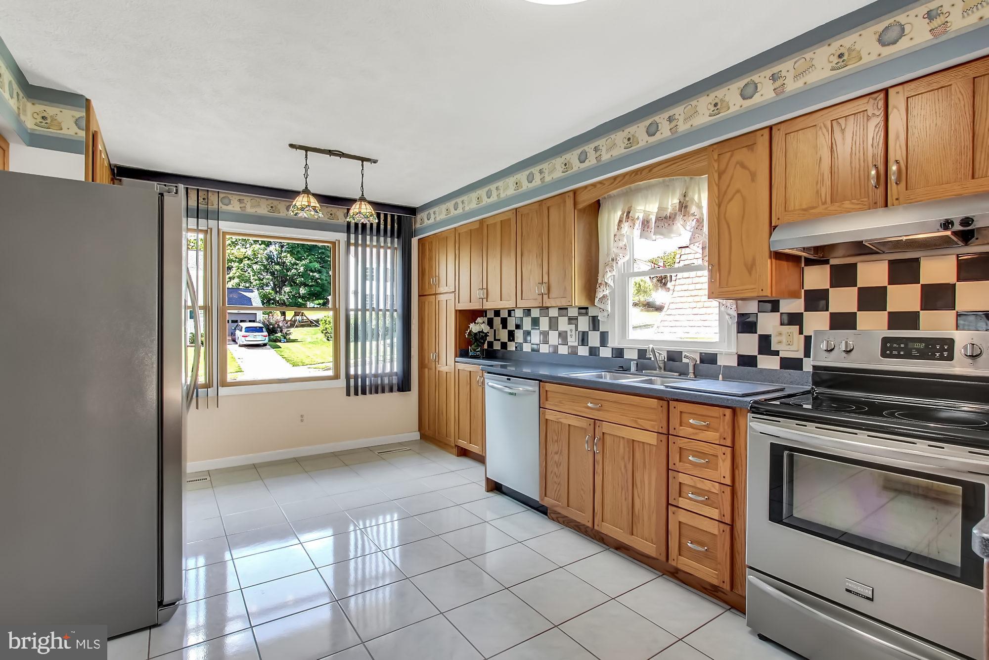 10811 Sandringham Road Cockeysville, MD 21030 - Photo 13 of 36 Kitchen with table space...tiled floor...