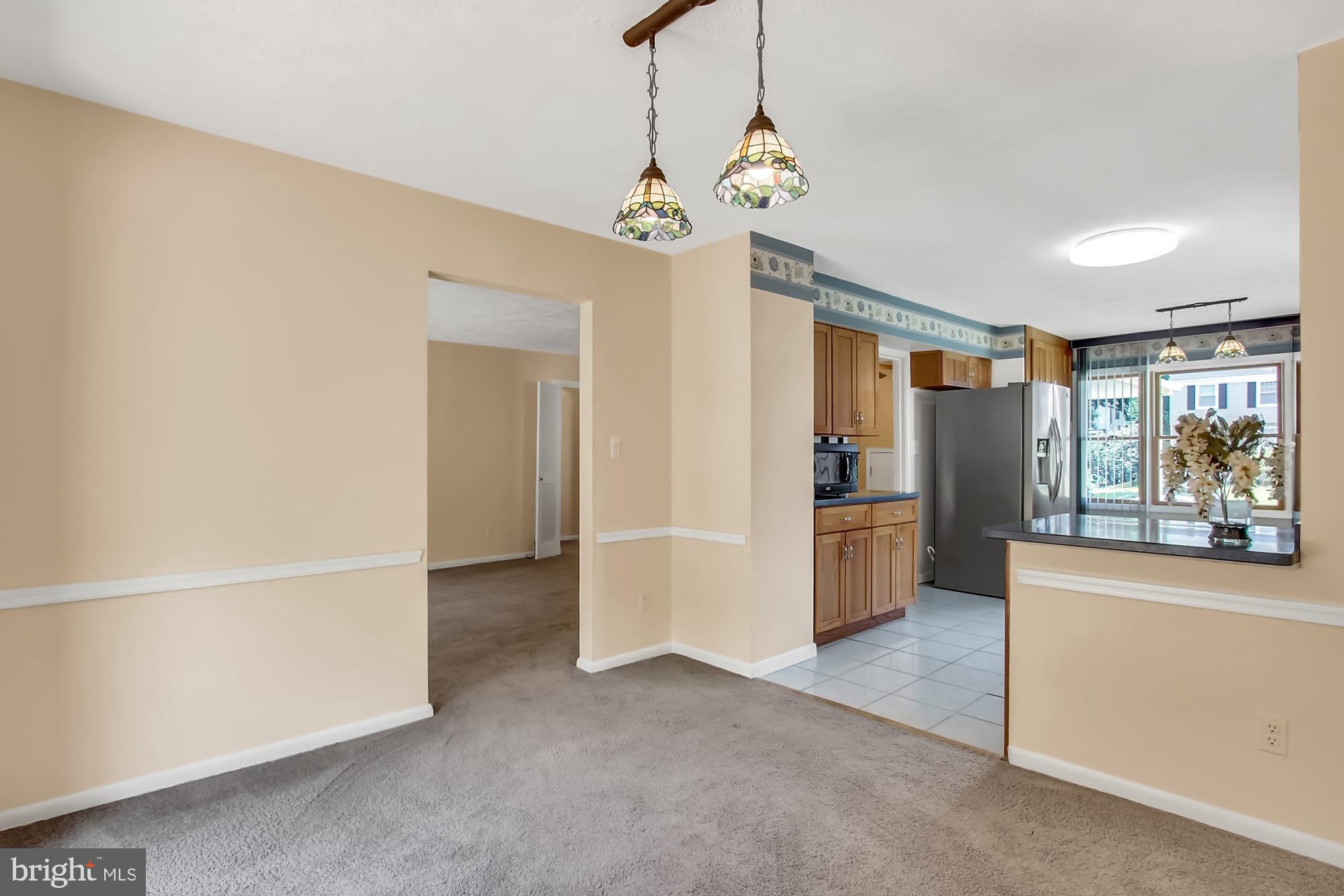 10811 Sandringham Road Cockeysville, MD 21030 - Photo 16 of 36 OPENS to lovely dining area....