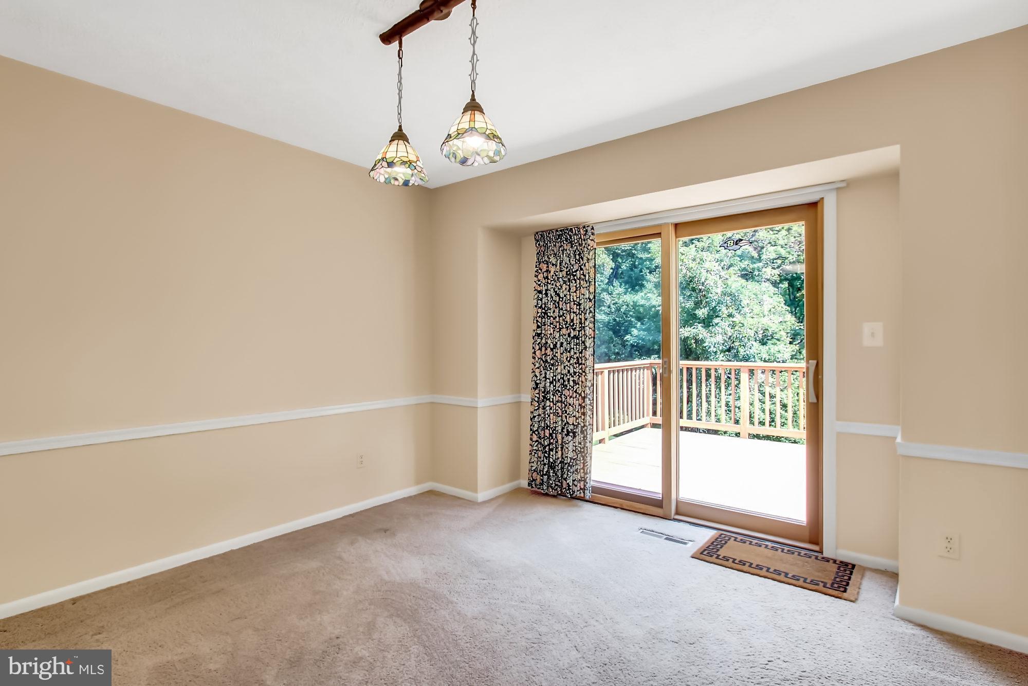 10811 Sandringham Road Cockeysville, MD 21030 - Photo 18 of 36 Sliding door to deck and private treed setting!