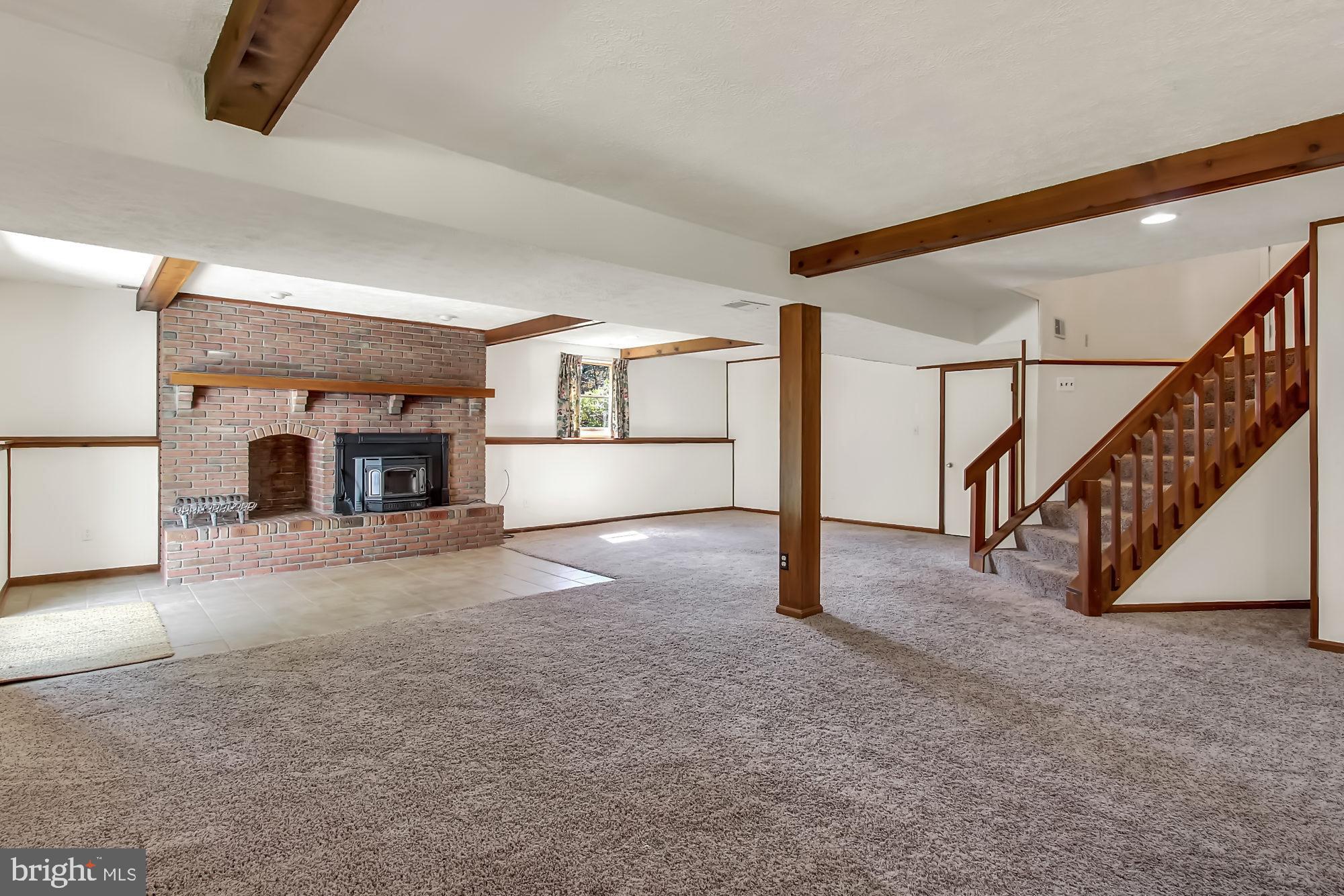 10811 Sandringham Road Cockeysville, MD 21030 - Photo 20 of 36 Wood fireplace now features wood stove...