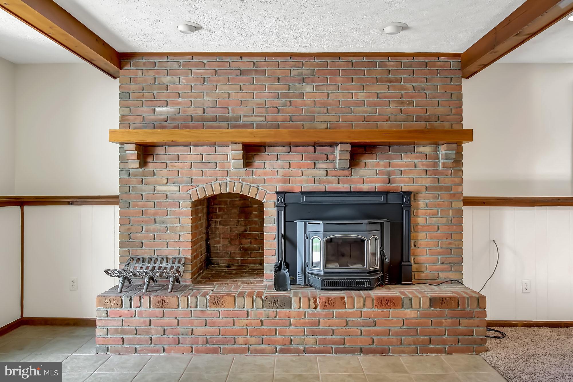 10811 Sandringham Road Cockeysville, MD 21030 - Photo 22 of 36 Fireplace & hearth - now with Woodstove