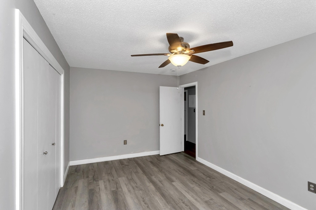 97 Collins Street, Unit 97 Chicopee, MA 01022 - Photo 16 of 21 a view of an empty room with a window