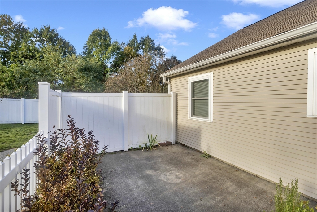 97 Collins Street, Unit 97 Chicopee, MA 01022 - Photo 19 of 21 a backyard of a house