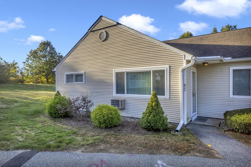 97 Collins Street, Unit 97 Chicopee, MA 01022 - Photo 21 of 21 a view of a house with a yard