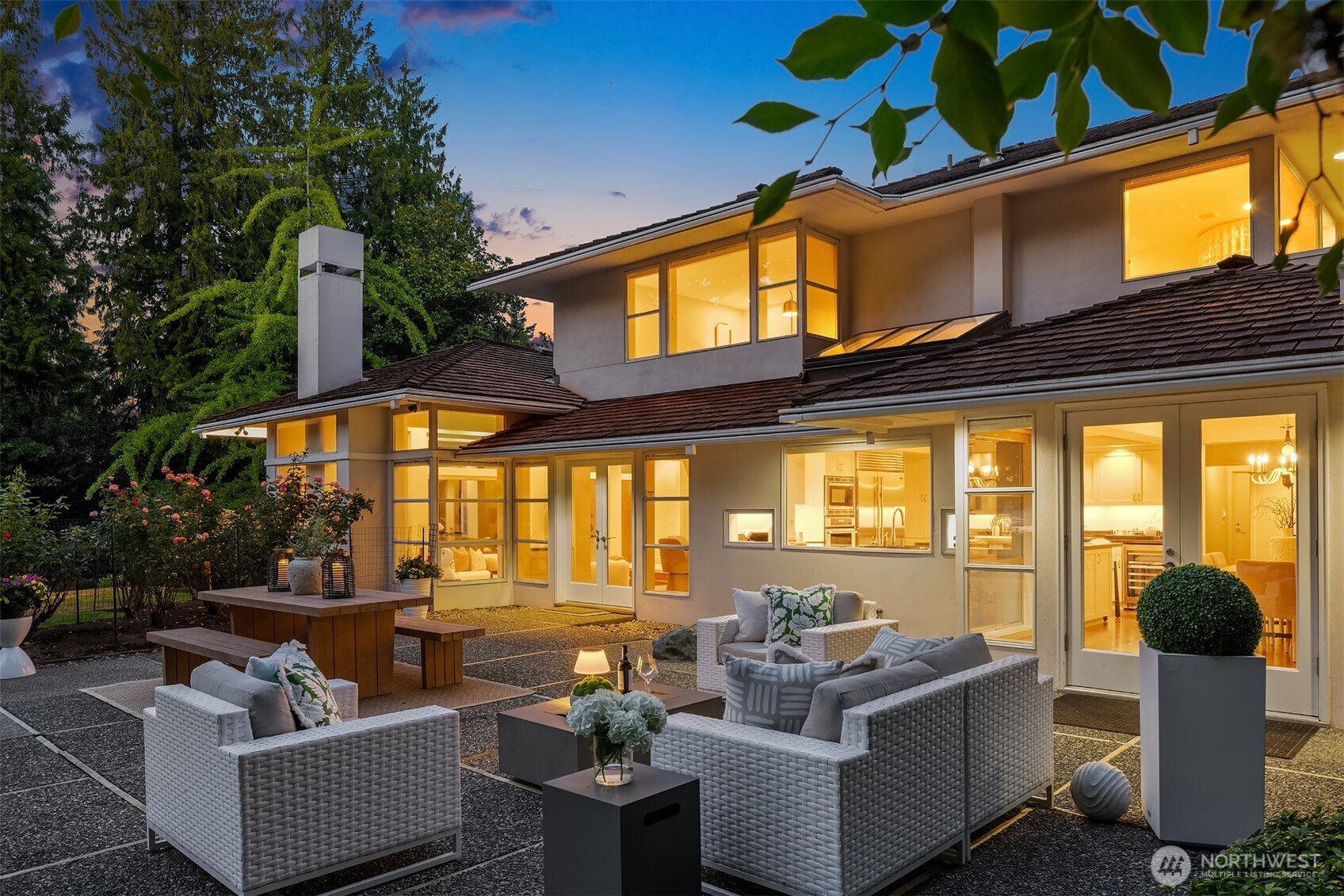 2609 Evergreen Point Road Medina, WA 98039 - Photo 1 of 39 a view of a patio with couches and potted plants