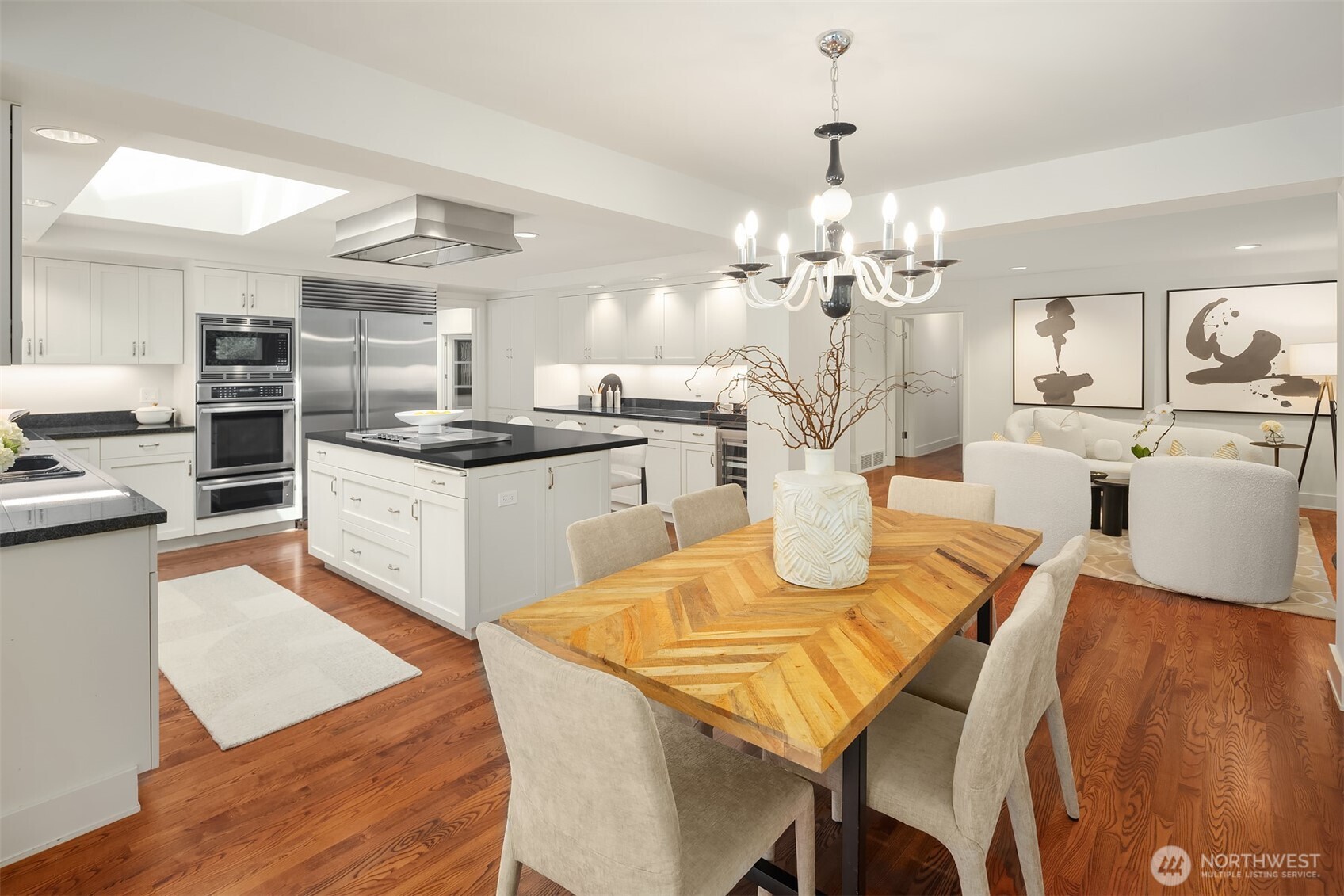 2609 Evergreen Point Road Medina, WA 98039 - Photo 14 of 39 a view of a dining room kitchen and a chandelier