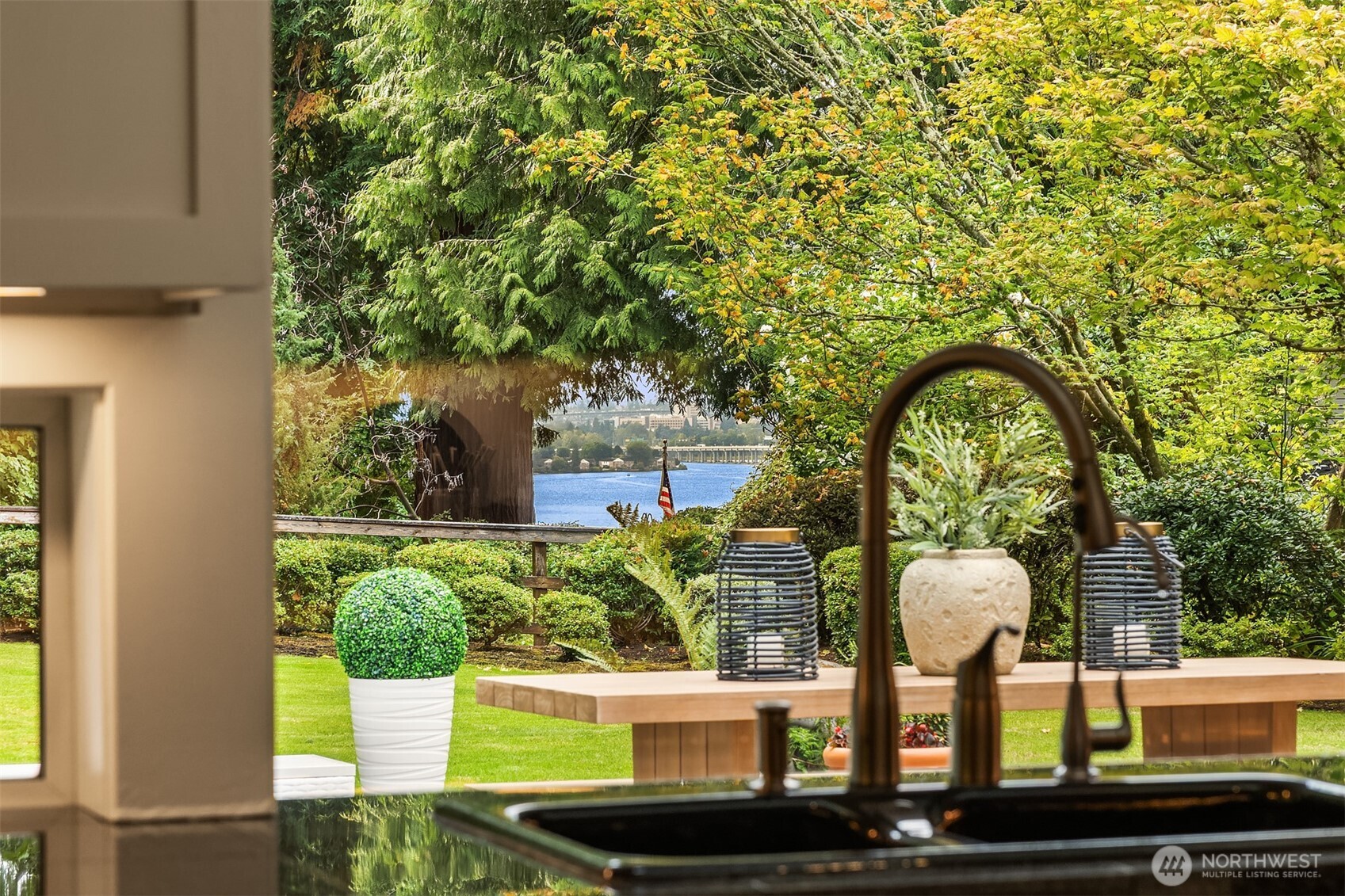 2609 Evergreen Point Road Medina, WA 98039 - Photo 4 of 39 a front view of a house with garden