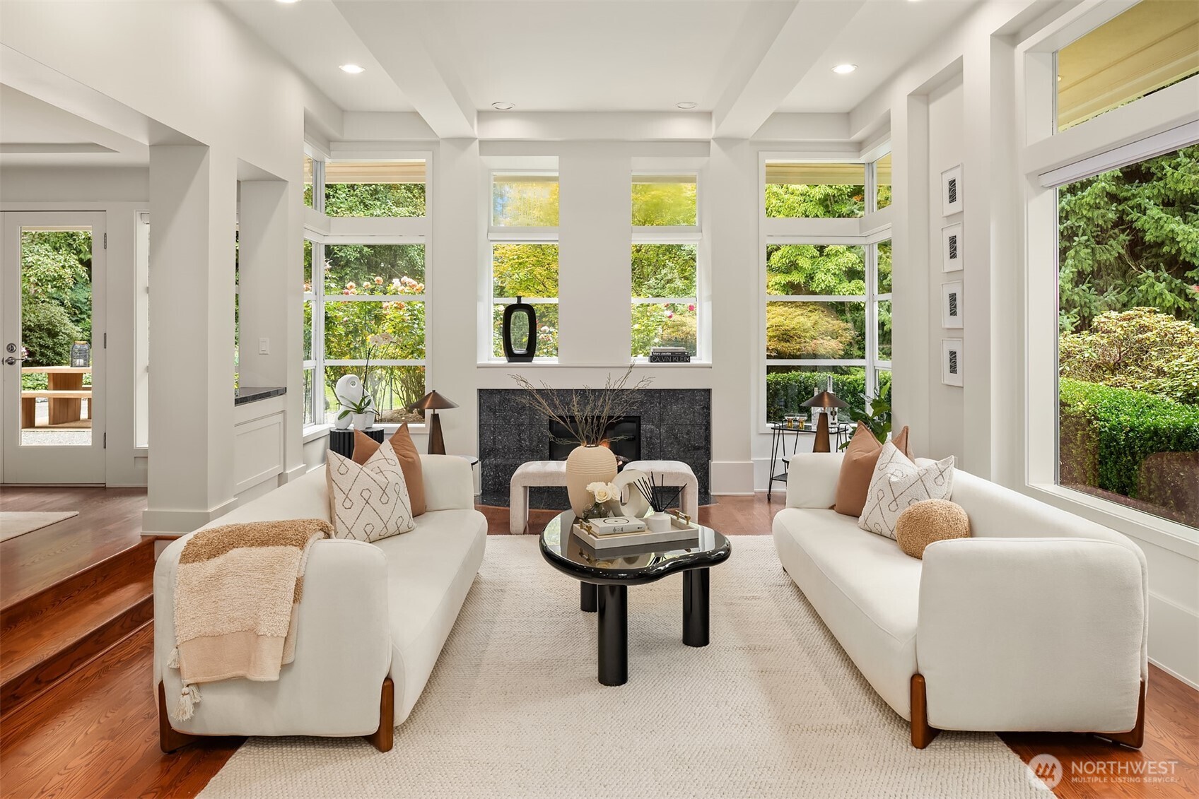2609 Evergreen Point Road Medina, WA 98039 - Photo 9 of 39 a living room with furniture and a large window