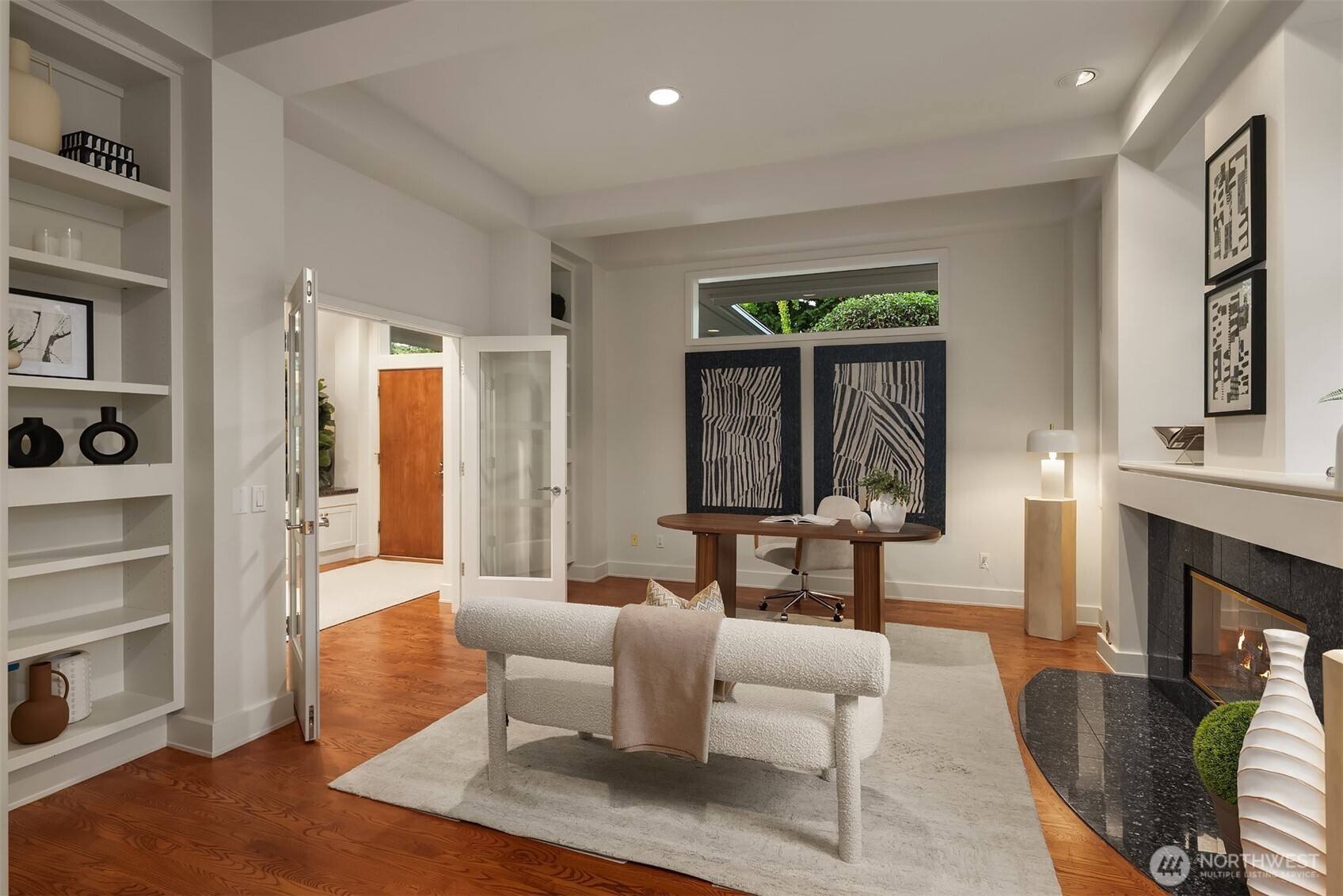 2609 Evergreen Point Road Medina, WA 98039 - Photo 10 of 39 a living room with furniture and a fireplace