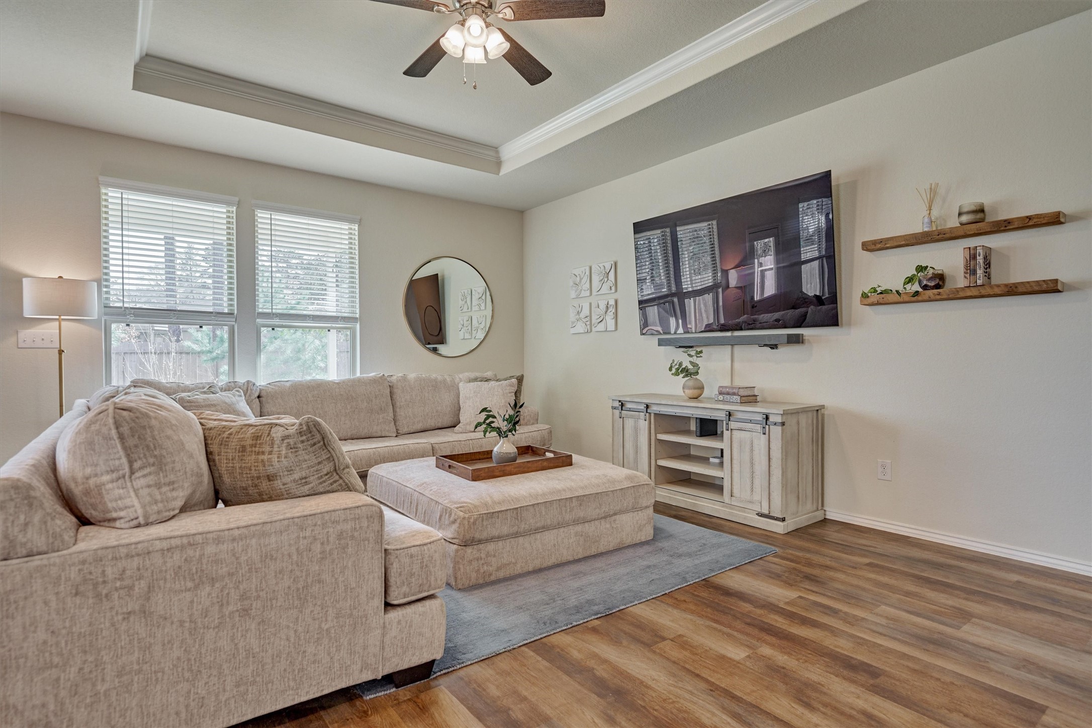 4417 Longleaf Timbers Court Conroe, TX 77304 - Photo 13 of 30 a living room with furniture and a wooden floor