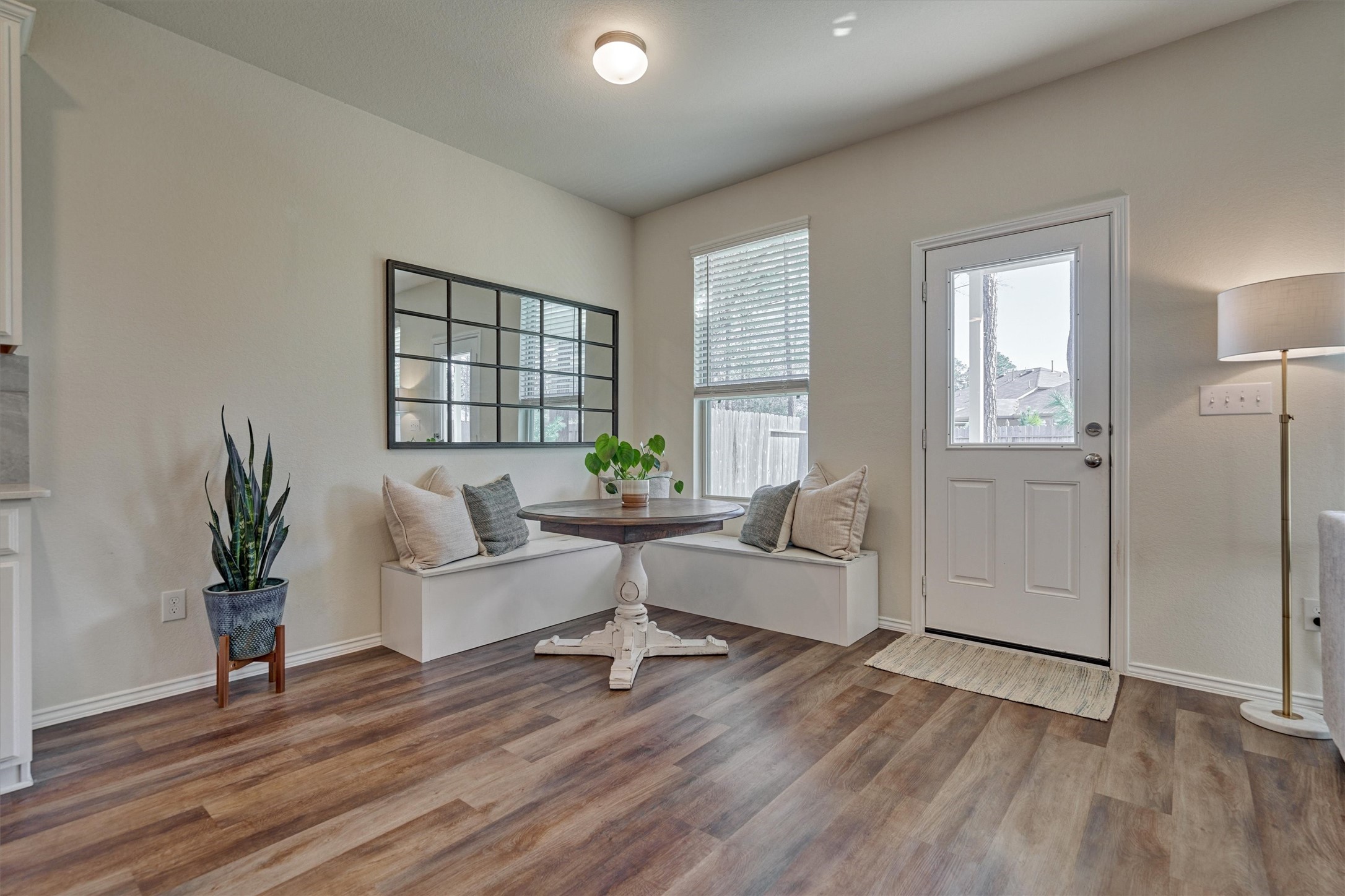 4417 Longleaf Timbers Court Conroe, TX 77304 - Photo 21 of 30 a living room with furniture and wooden floor