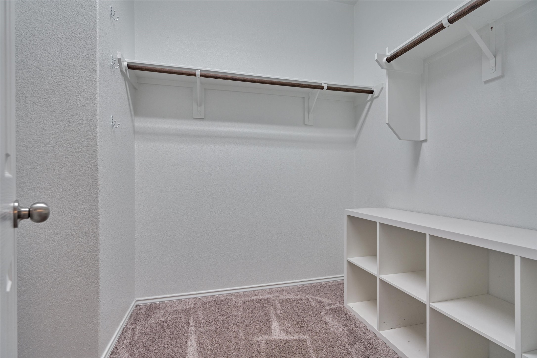4417 Longleaf Timbers Court Conroe, TX 77304 - Photo 26 of 30 a view of an empty walk in closet