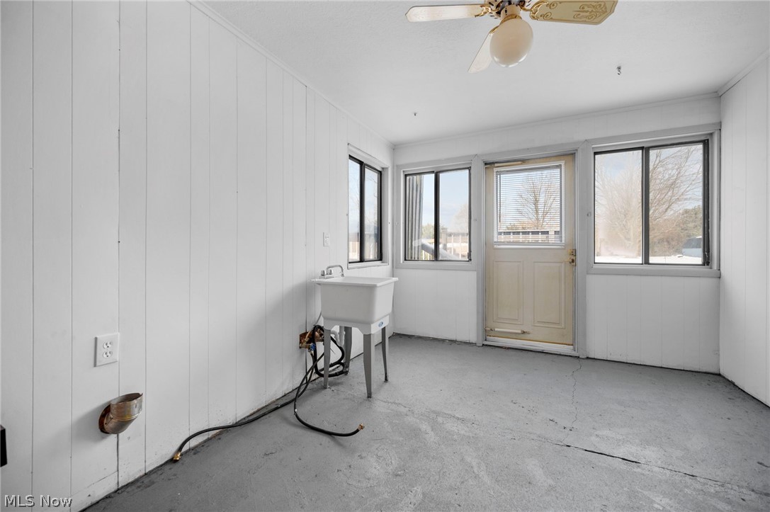 2099 Pontius Road Mogadore, OH 44260 - Photo 25 of 35 Unfurnished sunroom with healthy amount of natural light