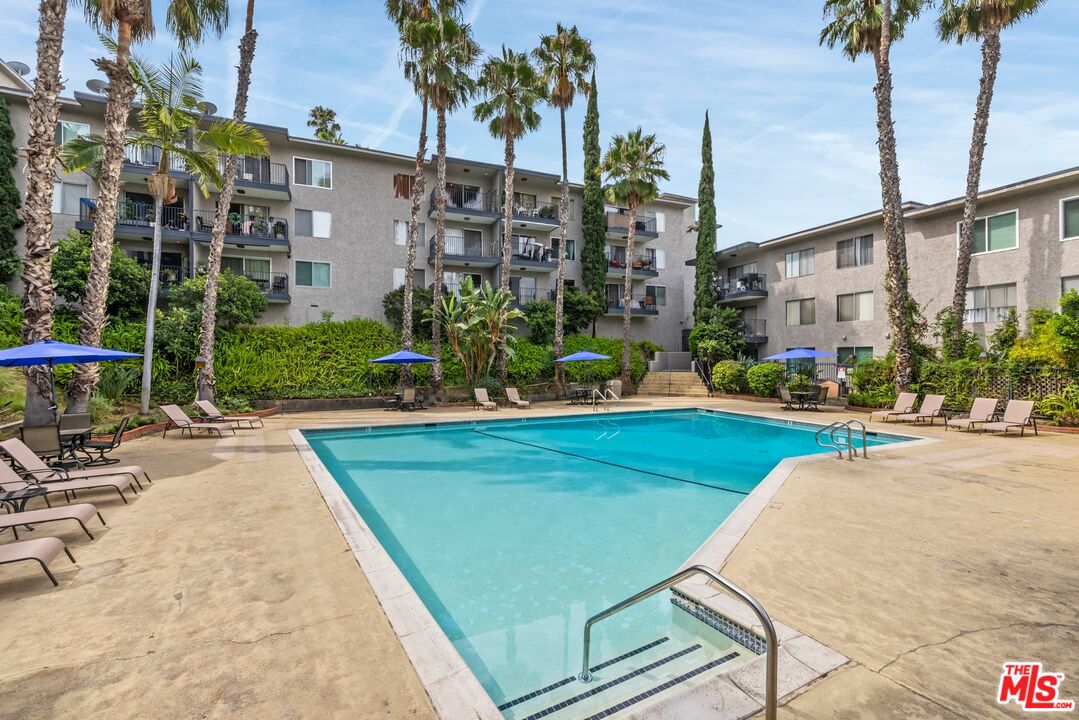 1517 East Garfield Avenue, Unit 23 Glendale, CA 91205 - Photo 13 of 14 a view of a backyard with a patio and plants