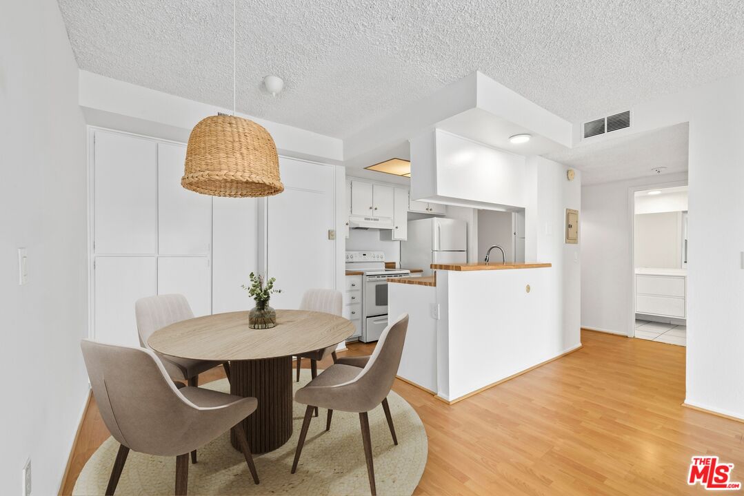 1517 East Garfield Avenue, Unit 23 Glendale, CA 91205 - Photo 3 of 14 a view of a dining room with furniture