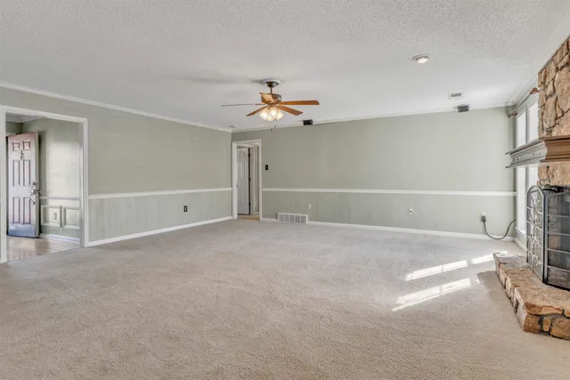 a view of a livingroom with a flat screen tv