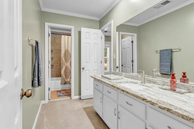 a bathroom with a shower curtain