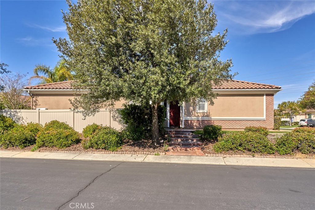 1143 Saguara Road Beaumont, CA 92223 - Photo 14 of 66 front view of a house with a yard