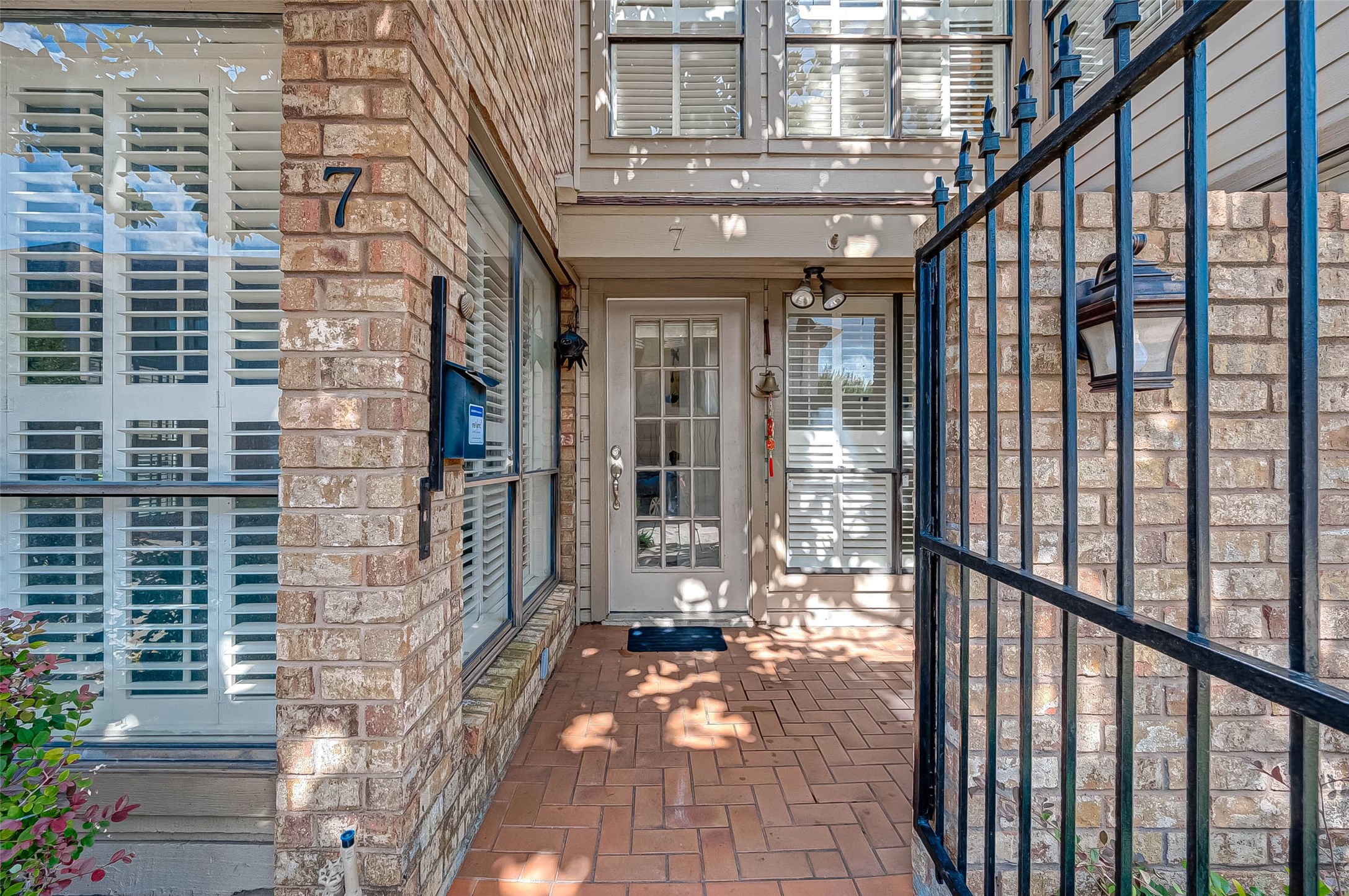 1908 Augusta Drive, Unit 7 Houston, TX 77057 - Photo 3 of 33 a view of a balcony with wooden floor and stairs