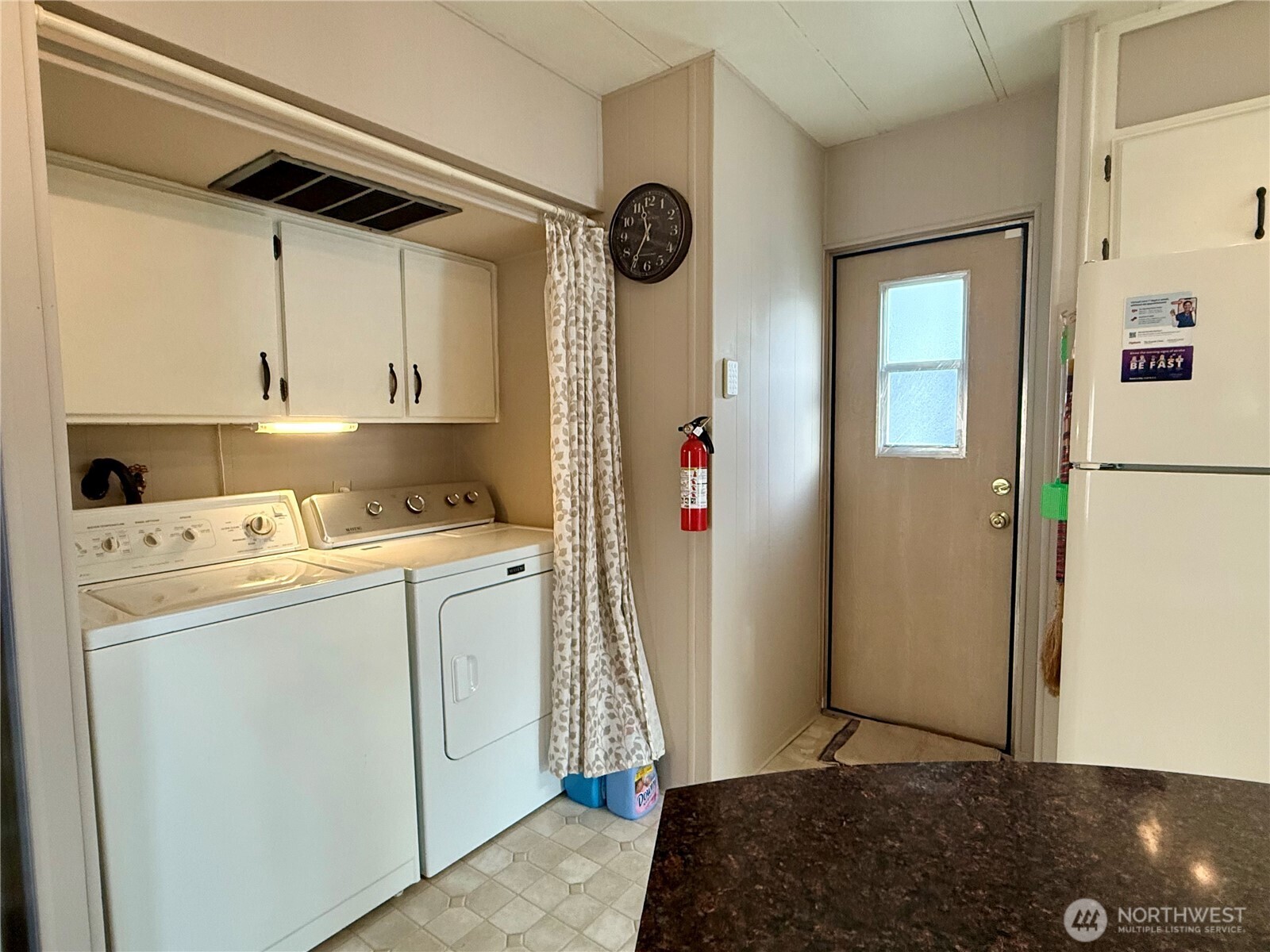 11622 Silver Lake Road, Unit 55 Everett, WA 98208 - Photo 14 of 21 a bedroom with a bed and a window