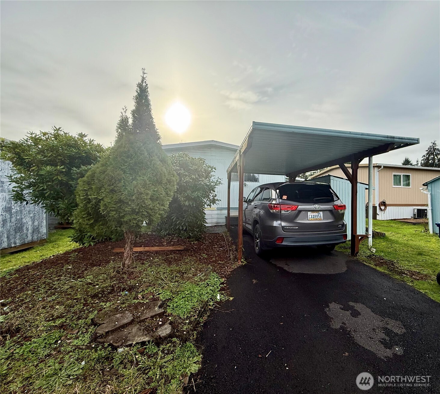 11622 Silver Lake Road, Unit 55 Everett, WA 98208 - Photo 16 of 21 a view of a car in a yard