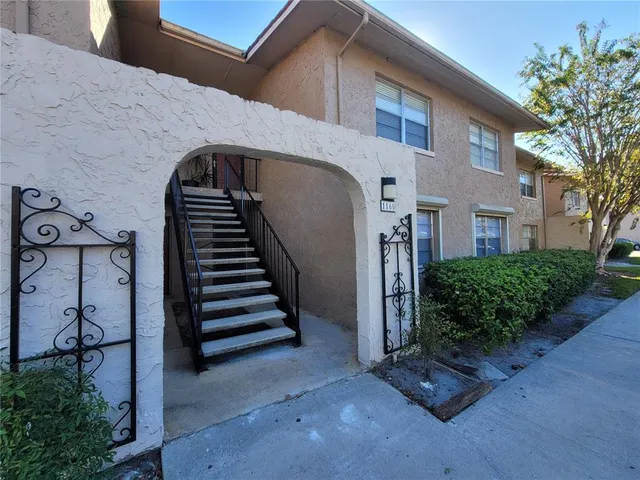 a view of a house with a stairs