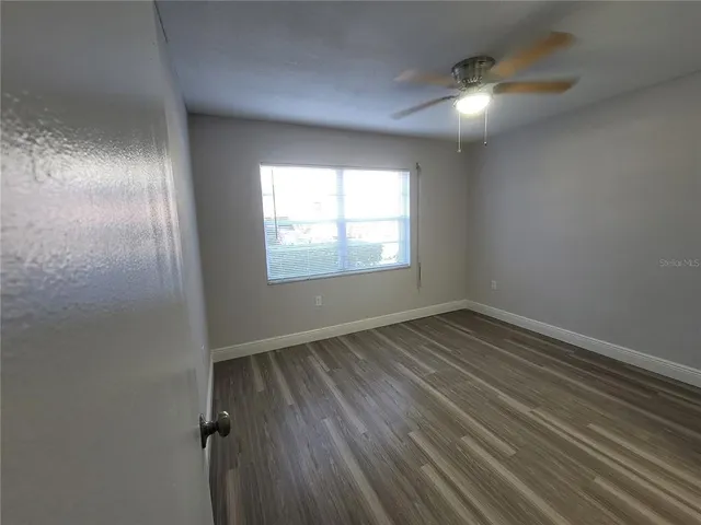 an empty room with window