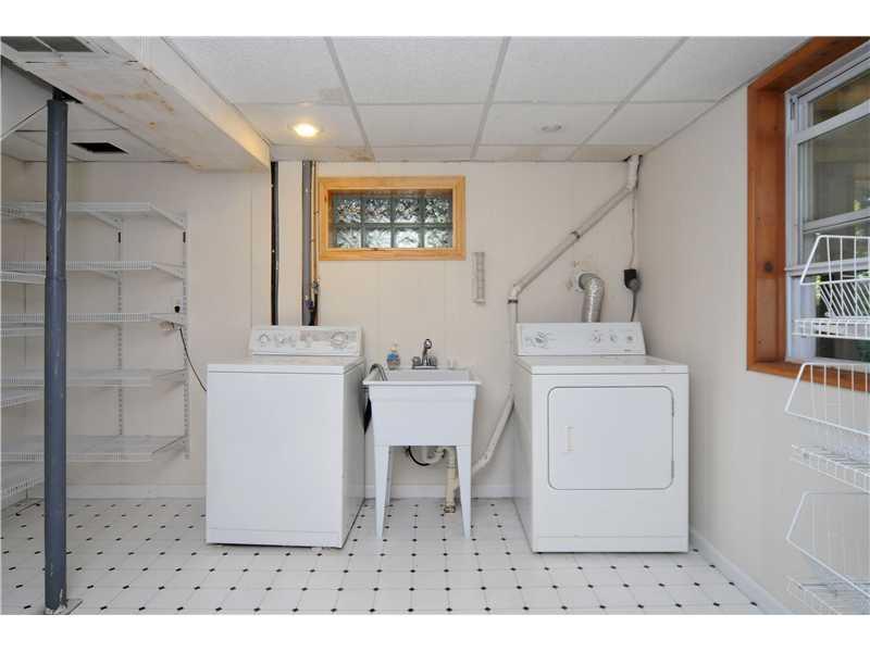 1529 Pine Run Road Rochester, PA 15074 - Photo 17 of 24 Other. Washer & dryer stay with the clean & bright laundry room. Lots of storage shelving too.