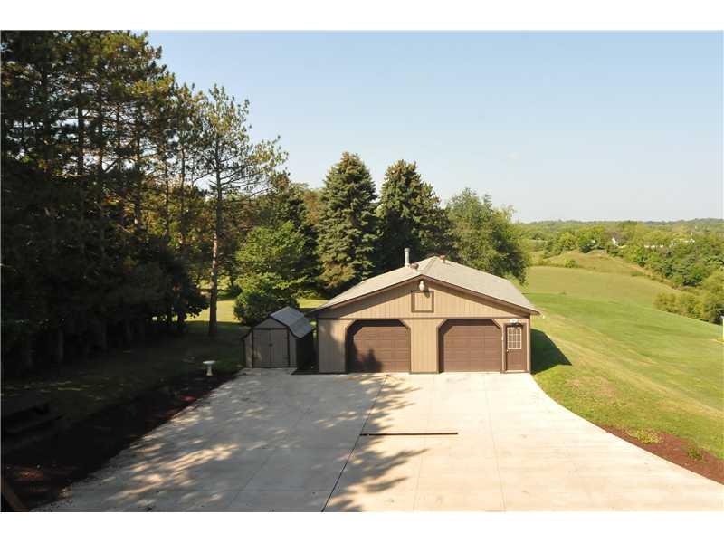 1529 Pine Run Road Rochester, PA 15074 - Photo 22 of 24 Parking Lot/Garage. The extra shed is great for the riding lawn mower & yard equipment.