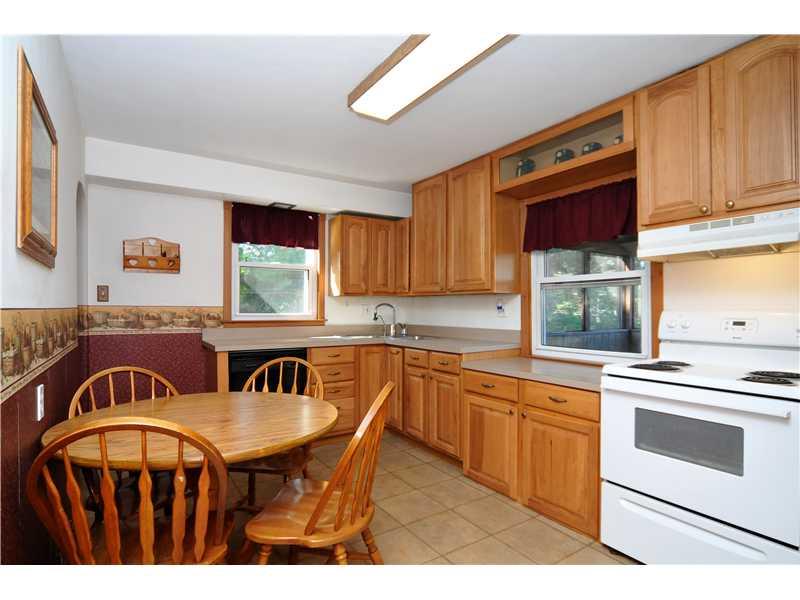 1529 Pine Run Road Rochester, PA 15074 - Photo 6 of 24 Kitchen. The eat in kitchen has been updated with solid wood cabinets, laminate counter tops & ceramic floor.