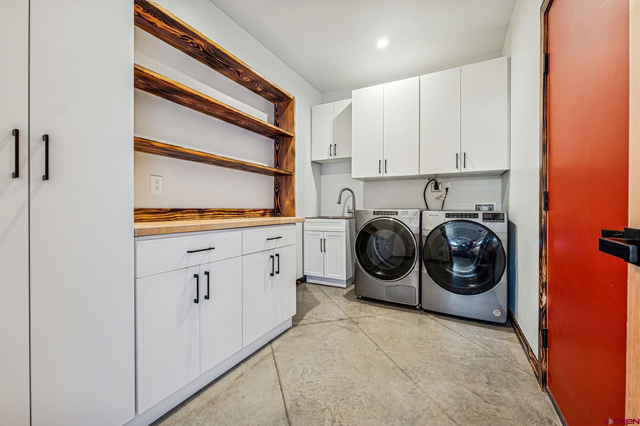227 Sage View Street Durango, CO 81301 - Photo 14 of 35 a utility room with dryer and washer