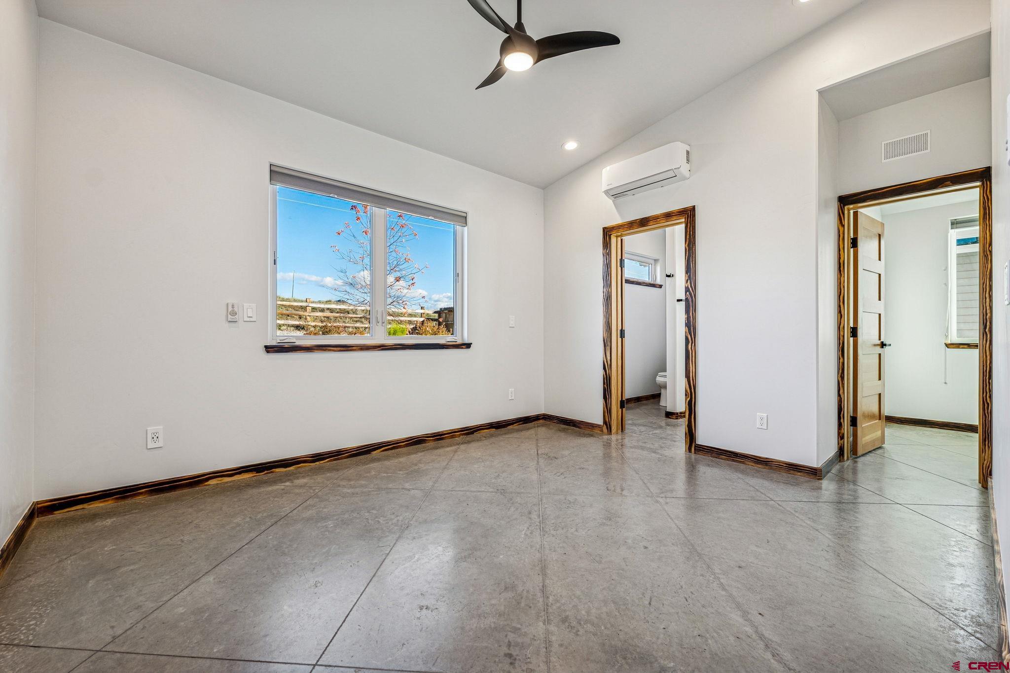 227 Sage View Street Durango, CO 81301 - Photo 17 of 35 a view of an empty room with a window